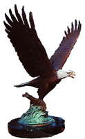 Bronze sculpture of an eagle just taking flight